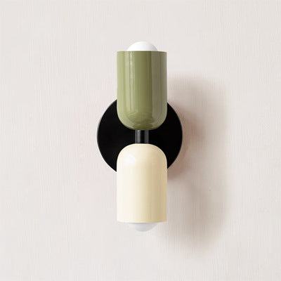 Elevate your space with the simple yet elegant design of our Cream Wall Sconce collection