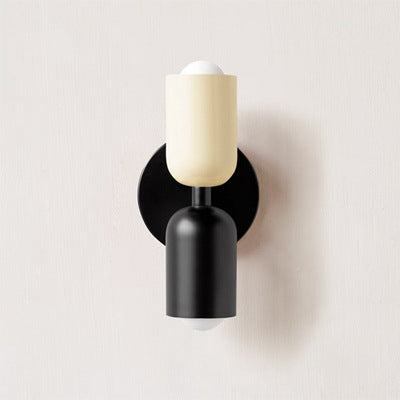 Modern cream metal wall scone with vary colors, sleek design for living or dining spaces.