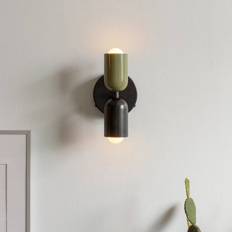 Elevate your space with the simple yet elegant design of our Cream Wall Sconce collection