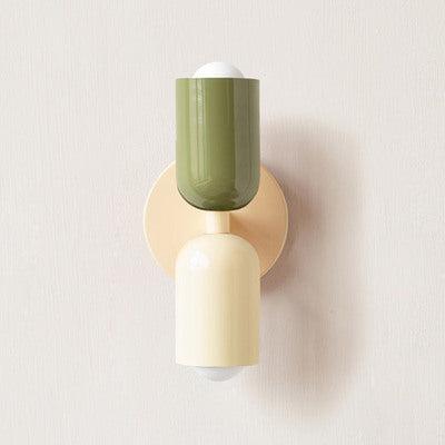 Elevate your space with the simple yet elegant design of our Cream Wall Sconce collection