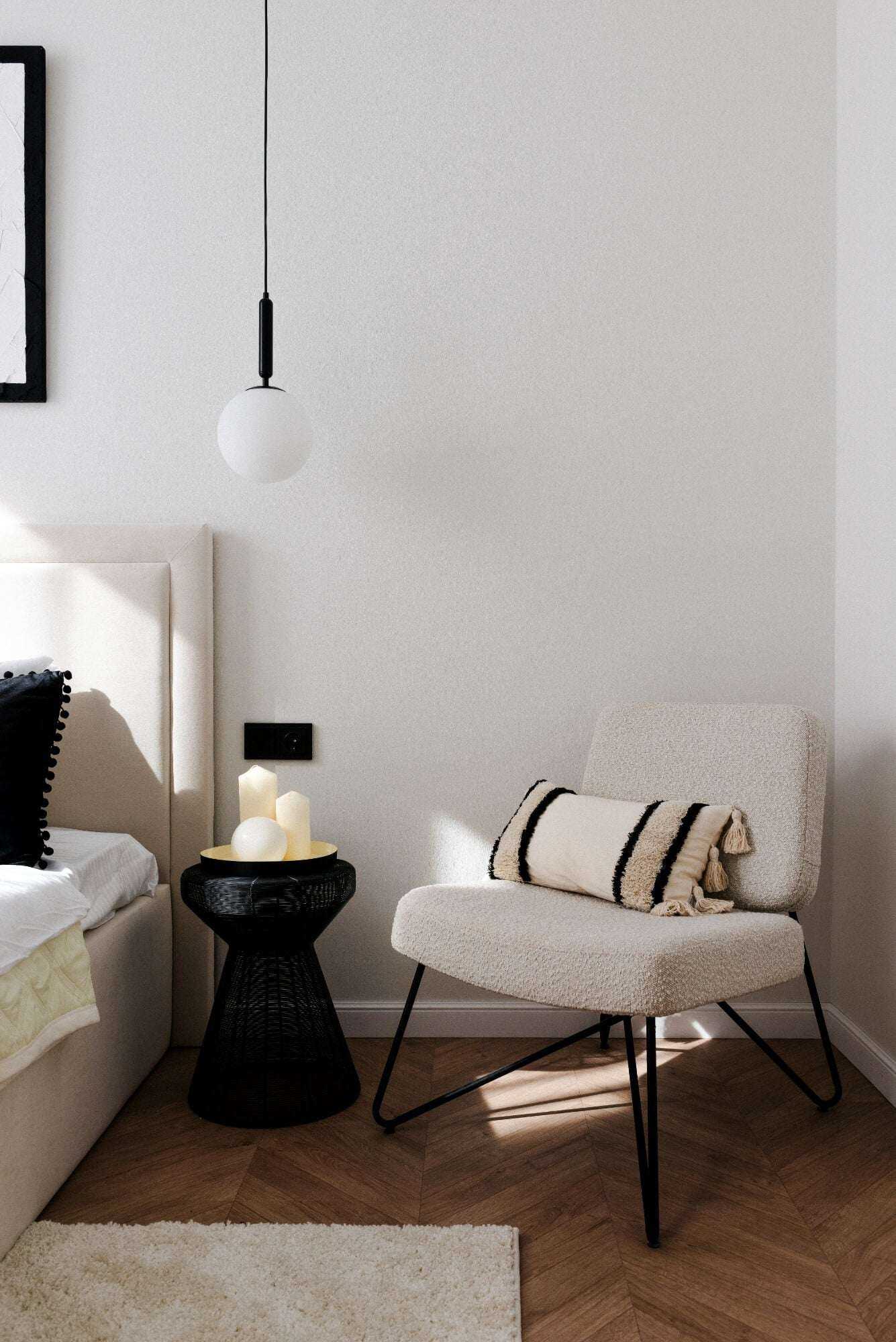 Modern Glass Ball Light Fixture hanging over a bedside table adding elegance to the bedroom decor.