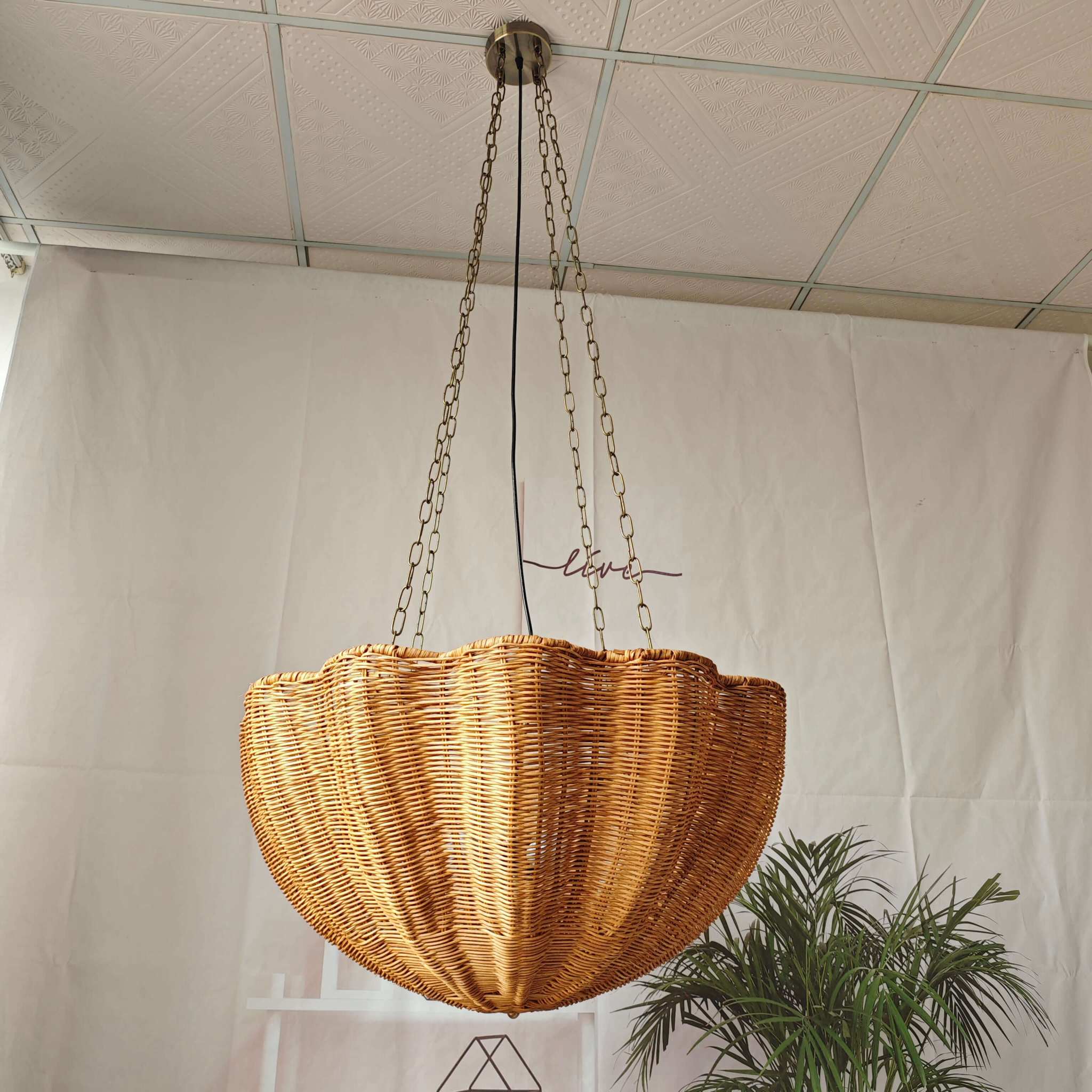 Rattan hanging basket lamp chandelier with chain, natural woven design, eco-friendly lighting.