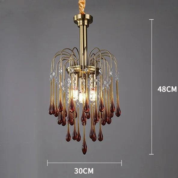 Colorful crystal chandelier with metal frame, featuring cascading raindrop design in red and white crystals, enhancing luxurious and romantic ambiance in a living space.