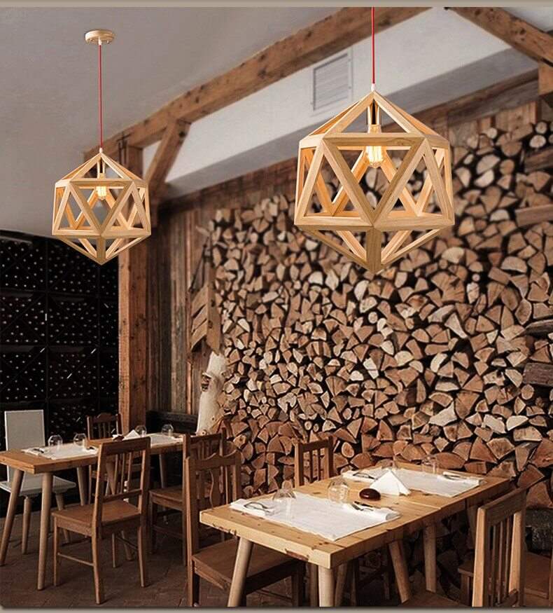 Geometric wooden pendant light with solid wood lampshade hanging in a stylish modern dining area.