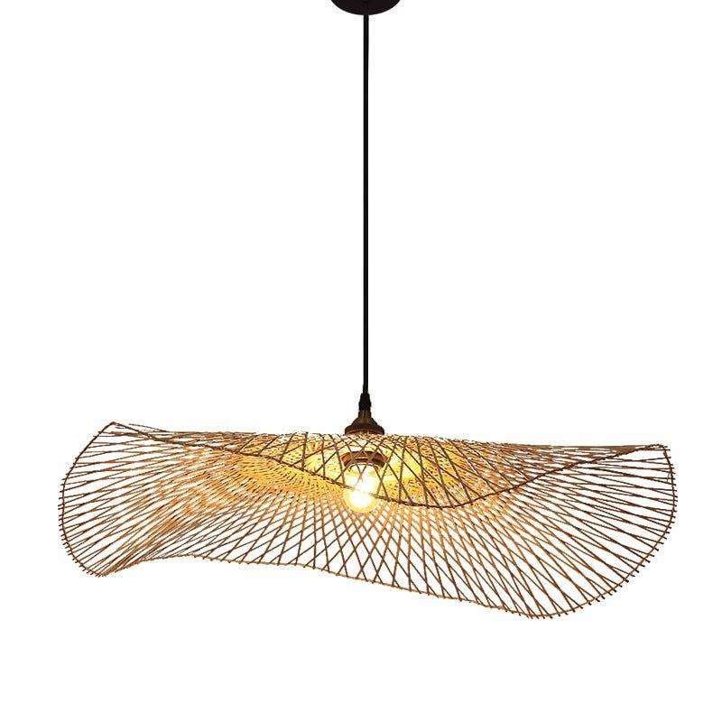 Handcrafted bamboo pendant lamp with butterfly design illuminating a modern interior space.