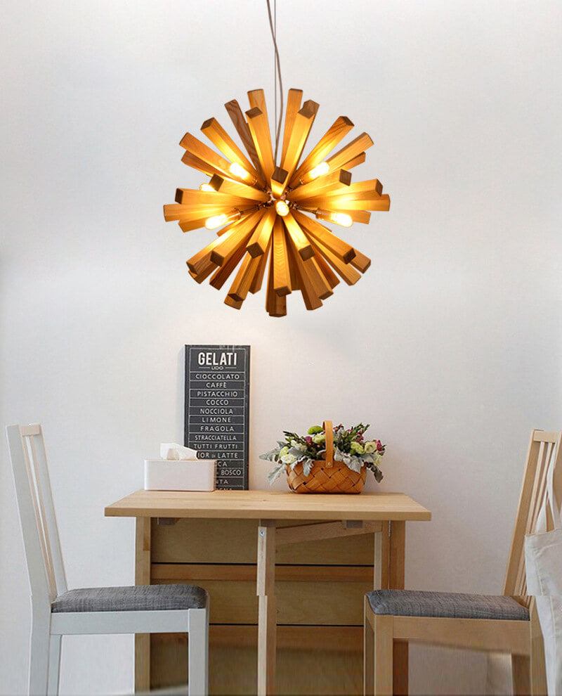 Solid wood oak chandelier above dining table with modern design.