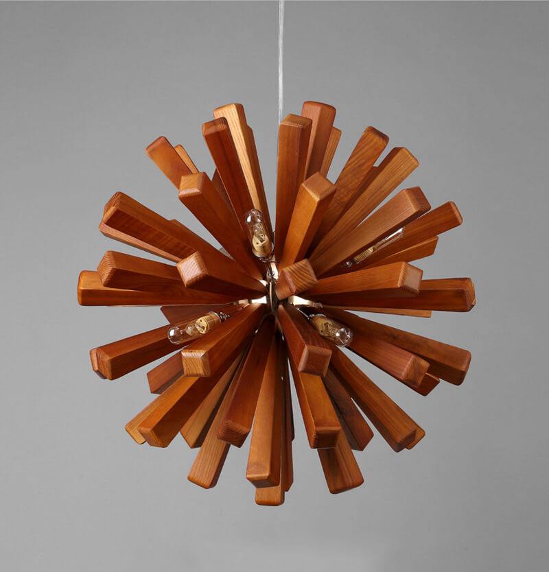 Solid wood oak chandelier, timber pendant light, with natural wood grain design in a modern dining room.
