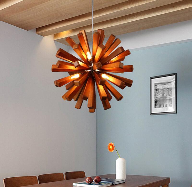 Solid wood oak chandelier above dining table with modern design.