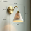 White adjustable wall lamp with pull chain switch, featuring a copper holder for durability and style.