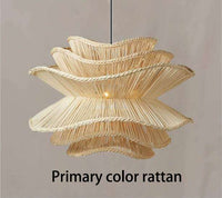 Beige rattan multi-level lamp with flower wicker light shade design, hanging from ceiling.