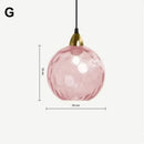 Glass cluster pendant light hanging from ceiling canopy