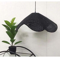 Hand-woven special-shaped rattan chandelier in black, simple decorative lighting fixture, indoor rustic elegance.