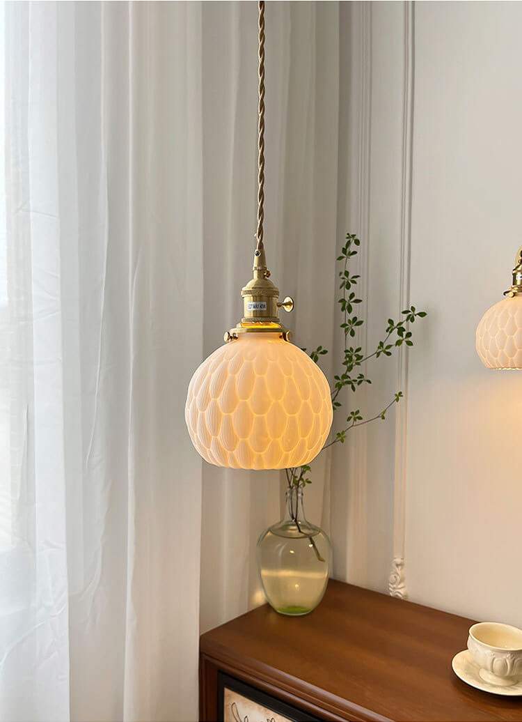 Japanese handmade ceramic pendant lamp with copper holders, featuring a white ceramic shade and integrated LED wall sconce, ideal for cozy and stylish settings.