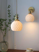 Japanese handmade ceramic pendant lamp with copper holders, featuring a white ceramic shade and integrated LED wall sconce, ideal for cozy and stylish settings.