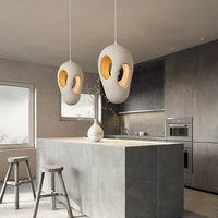 Japanese Wabi-Sabi LED Art Hanging Lamp in kitchen setting with minimalist design.