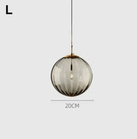 Glass cluster pendant light with clear colored glass globe shades