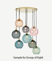 Glass cluster pendant light with multi colored glass globe shades