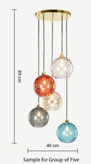 Glass cluster pendant light with multi colored glass globe shades
