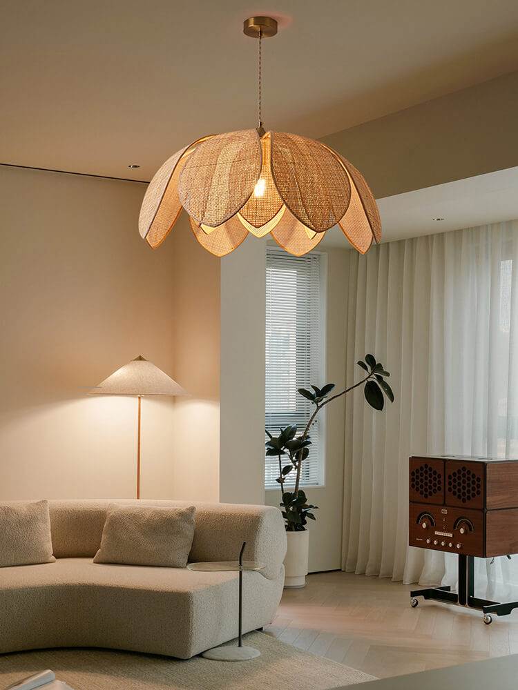 Natural rattan petal pendant light with lotus-inspired design, handcrafted from bamboo and rattan.