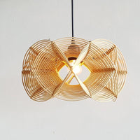 Handmade rattan pendant lights over a kitchen island in beige color