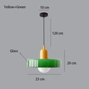 Nordic Glass Pendant Light in Candy Colors illuminating a minimalist interior space.