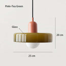 Nordic Glass Pendant Light in Candy Colors illuminating a minimalist interior space.