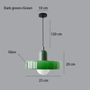 Nordic Glass Pendant Light in Candy Colors illuminating a minimalist interior space.