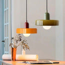Nordic Glass Pendant Light in Candy Colors illuminating a minimalist interior space.
