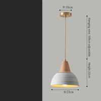 Handmade ceramic pendant light with wooden accents, featuring a minimalist design ideal for modern interiors.