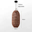 Vintage rattan hanging lights in a cozy, rustic interior setting.