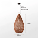 Vintage rattan hanging lights in a cozy, rustic interior setting.