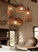 Vintage rattan hanging lights in a cozy, rustic interior setting.