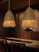 Retro woven rattan pendant light with hemp rope, rustic chandelier for serene ambiance.