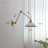 Modern ceramic wall lamp with copper swing arm and LED sconce, ideal for versatile home lighting.