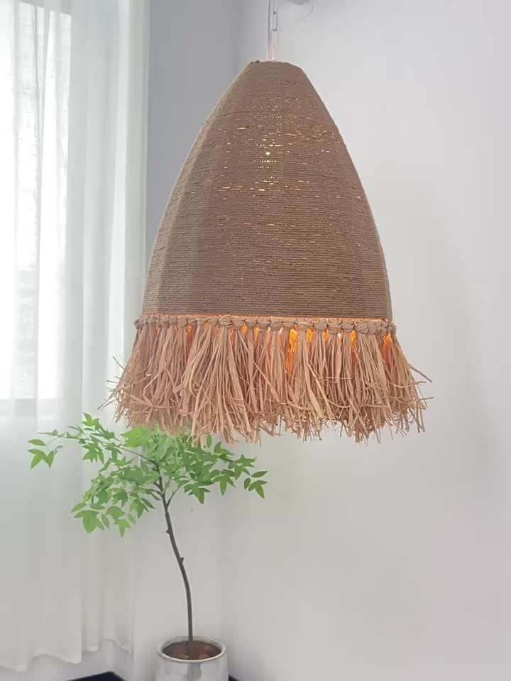 Retro woven Wabi Sabi rattan pendant light with hemp rope, rustic elegance, hand-knitted with natural materials, warm glow ambiance.