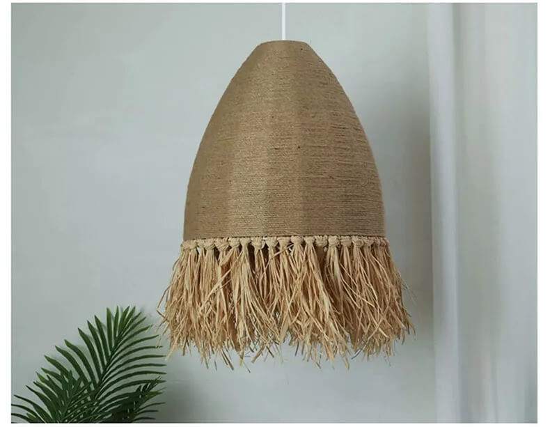 Retro woven Wabi Sabi rattan pendant light with hemp rope, rustic elegance, hand-knitted with natural materials, warm glow ambiance.