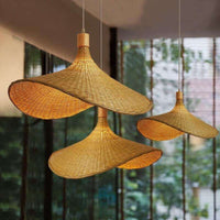 Bamboo handmade straw hat lampshade for indoor light fixtures, providing warm, soft lighting in living spaces.