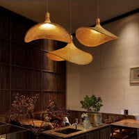 Bamboo handmade straw hat lampshade for indoor light fixtures, providing warm, soft lighting in living spaces.