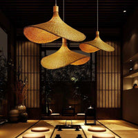 Bamboo handmade straw hat lampshade for indoor light fixtures, providing warm, soft lighting in living spaces.