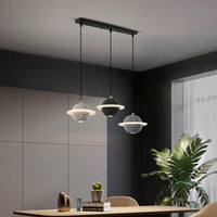 Modern LED cement pendant lamp in dinning room setting, featuring Nordic styling and adjustable cords for contemporary interiors.