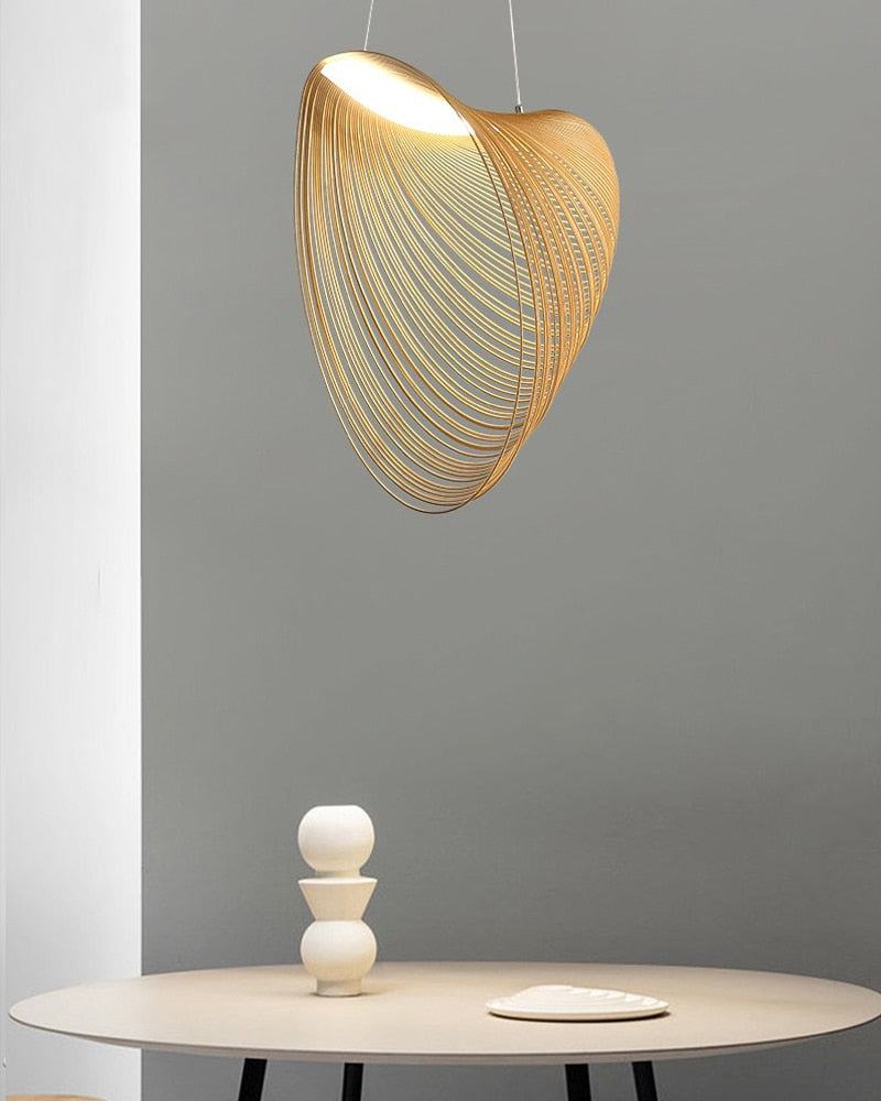 Nordic Wood Pendant Light with snail-shaped wood design and LED lighting above a modern interior setting.